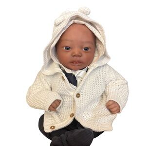 Realistic Baby Doll with White Knit Outfit